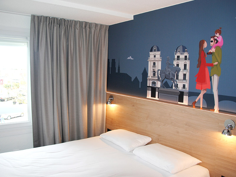 Design d'une chambre d'hôtel Kyriad Direct Orléans